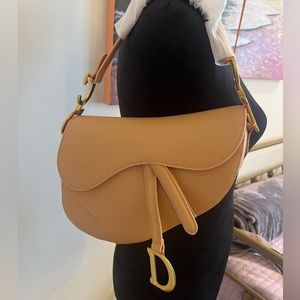 NWT brown leather saddle bag